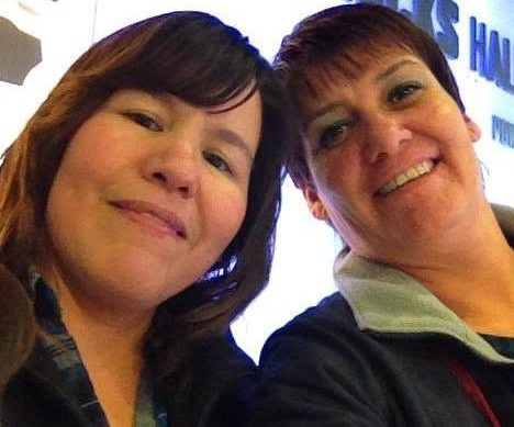 rosalie and michelle at hockey game Grant Gustafson